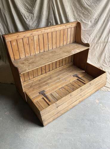 A rare antique 19th century vernacular pine Irish settle bed