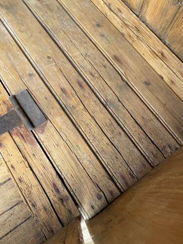 A rare antique 19th century vernacular pine Irish settle bed