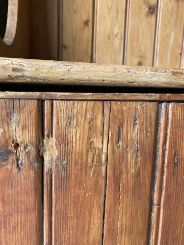 A rare antique 19th century vernacular pine Irish settle bed