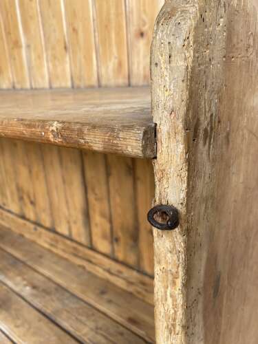 A rare antique 19th century vernacular pine Irish settle bed