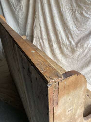 A rare antique 19th century vernacular pine Irish settle bed
