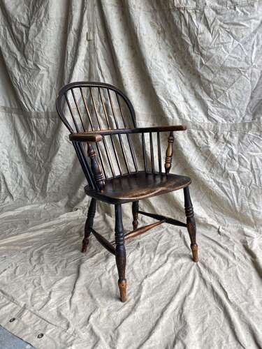 An antique 19th century elm and ash hoop and stick back Windsor chair