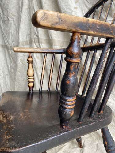 An antique 19th century elm and ash hoop and stick back Windsor chair