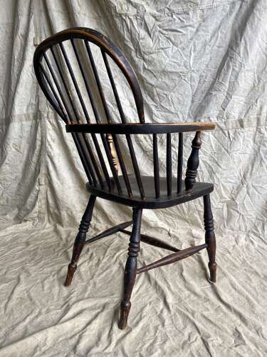 An antique 19th century elm and ash hoop and stick back Windsor chair