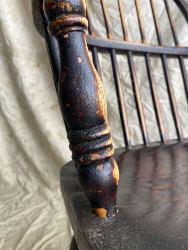 An antique 19th century elm and ash hoop and stick back Windsor chair