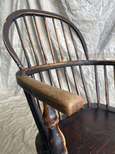 An antique 19th century elm and ash hoop and stick back Windsor chair