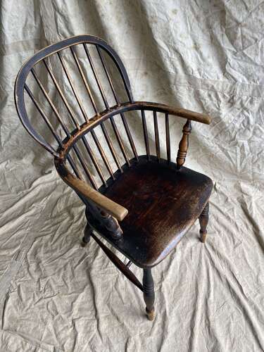 An antique 19th century elm and ash hoop and stick back Windsor chair