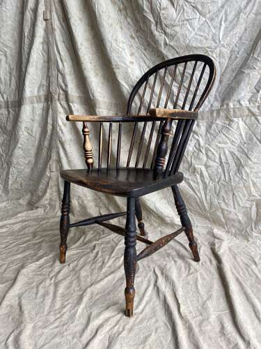 An antique 19th century elm and ash hoop and stick back Windsor chair