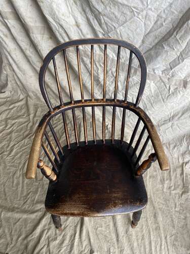 An antique 19th century elm and ash hoop and stick back Windsor chair