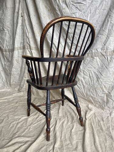 An antique 19th century elm and ash hoop and stick back Windsor chair