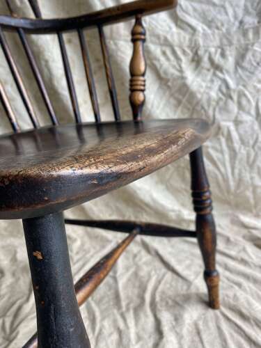 An antique 19th century elm and ash hoop and stick back Windsor chair