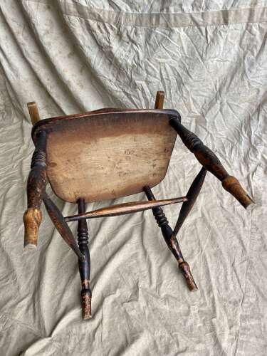 An antique 19th century elm and ash hoop and stick back Windsor chair
