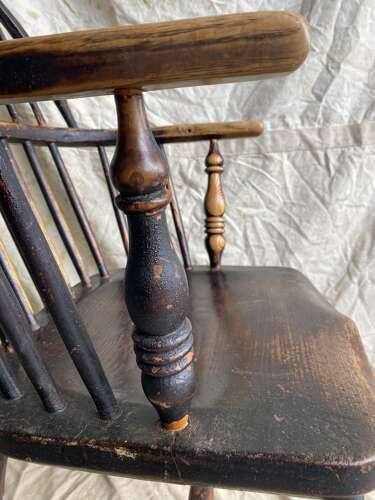 An antique 19th century elm and ash hoop and stick back Windsor chair