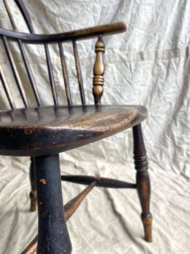 An antique 19th century elm and ash hoop and stick back Windsor chair