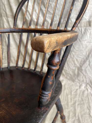An antique 19th century elm and ash hoop and stick back Windsor chair