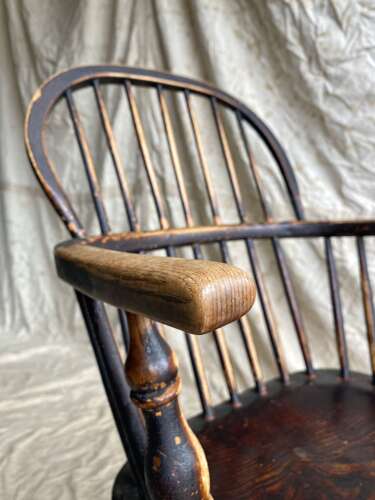 An antique 19th century elm and ash hoop and stick back Windsor chair