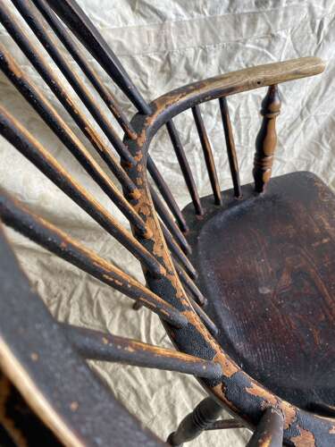 An antique 19th century elm and ash hoop and stick back Windsor chair