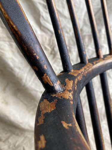 An antique 19th century elm and ash hoop and stick back Windsor chair