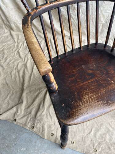 An antique 19th century elm and ash hoop and stick back Windsor chair