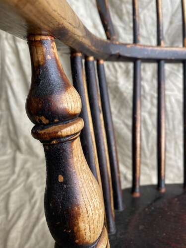 An antique 19th century elm and ash hoop and stick back Windsor chair