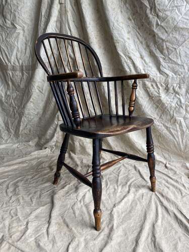 An antique 19th century elm and ash hoop and stick back Windsor chair