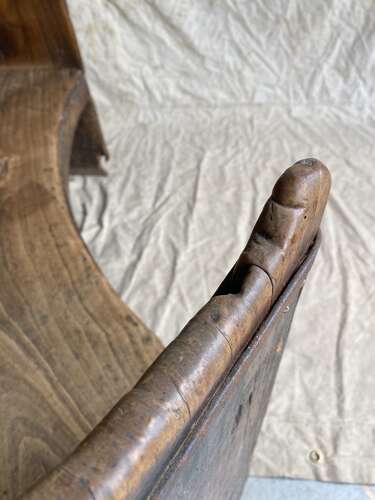 A rare antique 17th century James II elm barrel back tavern settle