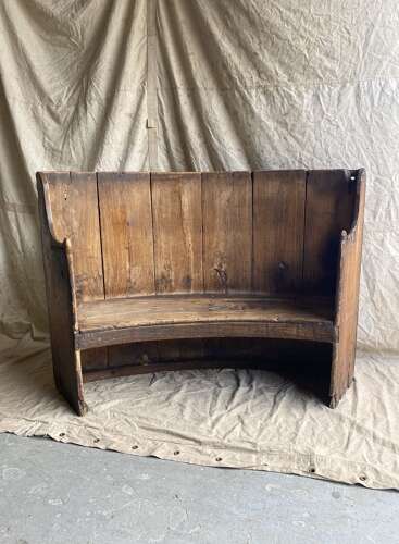 A rare antique 17th century James II elm barrel back tavern settle