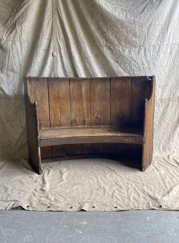 A rare antique 17th century James II elm barrel back tavern settle
