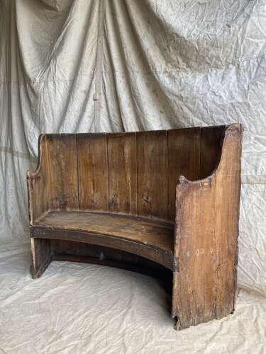 A rare antique 17th century James II elm barrel back tavern settle