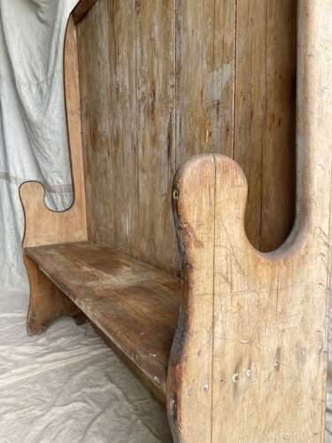 A provincial antique 19th century Welsh pine tavern settle bench