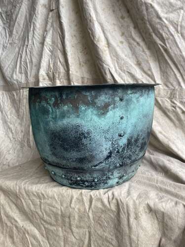 An antique early 19th century riveted copper planter