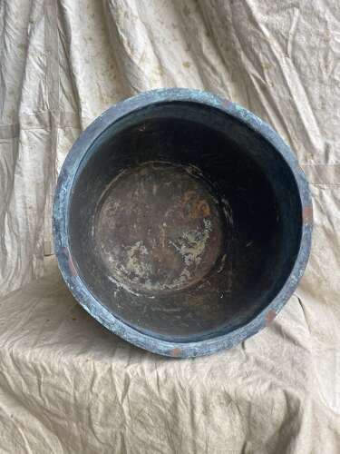 An antique early 19th century riveted copper planter