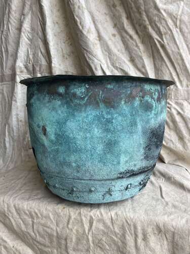An antique early 19th century riveted copper planter