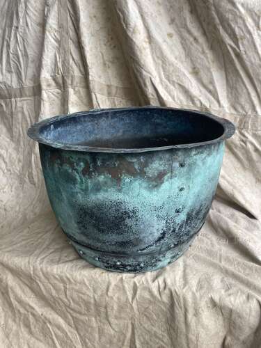 An antique early 19th century riveted copper planter