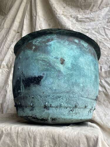 An antique early 19th century riveted copper planter