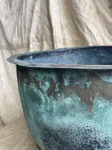 An antique early 19th century riveted copper planter