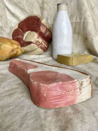 A collection of vintage 1950s Electrolux shop advertising display food