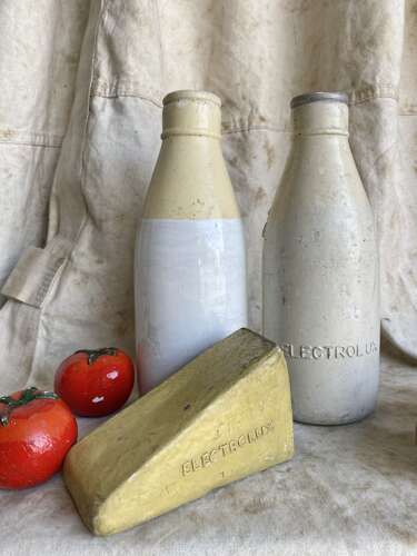 A collection of vintage 1950s Electrolux shop advertising display food