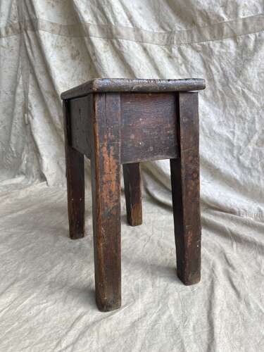 An antique early 20th century Welsh 'Daisy' rustic pine milking stool