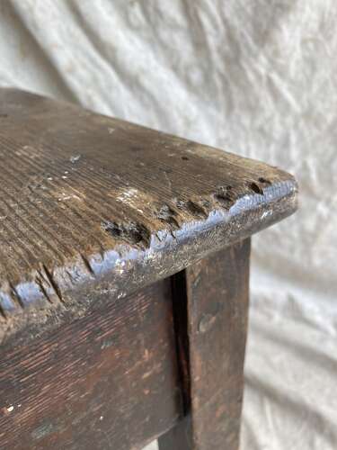 An antique early 20th century Welsh 'Daisy' rustic pine milking stool