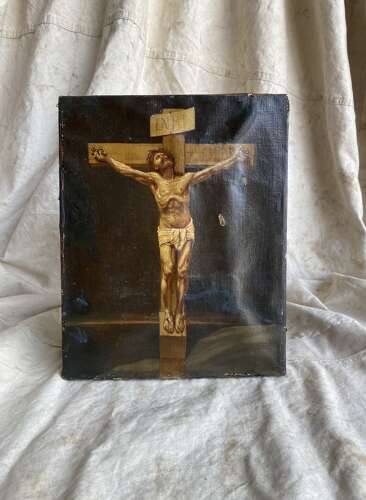 An antique 19th century oil painting of the crucifixion