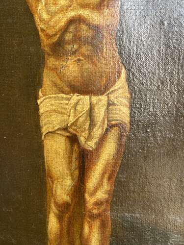 An antique 19th century oil painting of the crucifixion