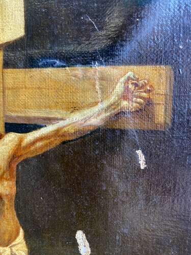 An antique 19th century oil painting of the crucifixion