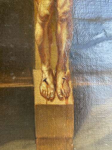 An antique 19th century oil painting of the crucifixion
