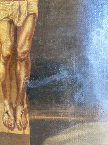 An antique 19th century oil painting of the crucifixion