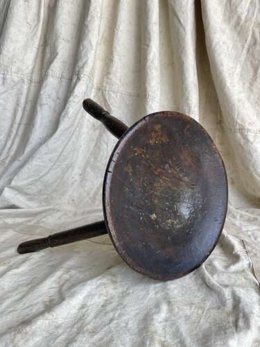 A traditional antique mid 19th century Welsh pole lathe turned dairy stool