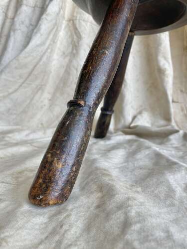 A traditional antique mid 19th century Welsh pole lathe turned dairy stool