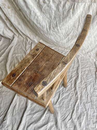 An antique 19th century vernacular Irish hedge chair