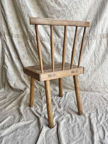 An antique 19th century vernacular Irish hedge chair