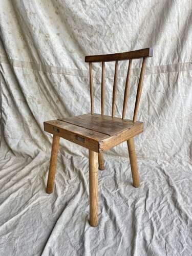 An antique 19th century vernacular Irish hedge chair